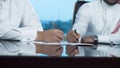 Two Saudi Businessmen Hands Signing A Ducument