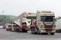 Two Scania Trucks Haul Long Industrial Object