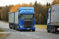 Two Scania Trucks Meet on the Road Royalty Free Stock Photo