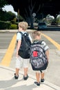 Two school children at crosswalk