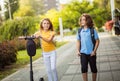 Brother and sister going home after school Royalty Free Stock Photo