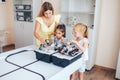 Two schoolgirls study in a robotics class, assemble a robot constructor Royalty Free Stock Photo