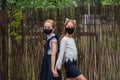 Two schoolgirls wearing masks and going back to school during covid-19 pandemic.Two schoolgirls wearing protective masks Royalty Free Stock Photo