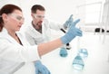 Two scientists chemists conduct research in the laboratory