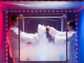 Two scientists conducting tests in sterile chamber Royalty Free Stock Photo