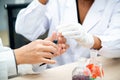 Two scientists are working in laboratory.Young female researcher and her senior supervisor are doing investigations on laboratory. Royalty Free Stock Photo