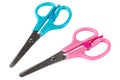 Two scissors for creativity or for the office, with cyan and pink handles, on a white background Royalty Free Stock Photo