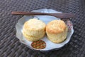 Two scones with wooden knife