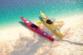 Two sea kayaks on the sand coast. 3D Royalty Free Stock Photo