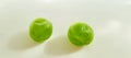 Two seeds of fresh green peas Royalty Free Stock Photo