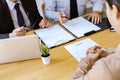 Two selection committee manager reading a resume during a job interview, Employer interviewing to ask young female job seeker for