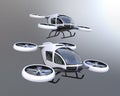 Two self-driving passenger drones flying in the sky Royalty Free Stock Photo