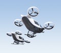 Two self-driving passenger drones flying in the sky Royalty Free Stock Photo