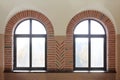 Two semi-antique round topped casement windows