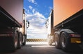 Two Semi Trucks a Parking with a Blue Sky. Industry Cargo Freight Truck. Logistics and Cargo Transport Concept. Royalty Free Stock Photo