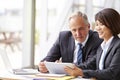 Two senior business colleagues at meeting, close-up