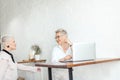 Two senior Business Women friends hugged office after meeting Royalty Free Stock Photo