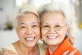 Two Senior Chinese Women Sitting At Home Royalty Free Stock Photo