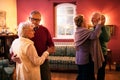 Two senior couple dancing and enjoy together at home Royalty Free Stock Photo