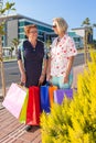 Two senior friends enjoying a days shopping Royalty Free Stock Photo