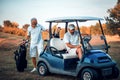 Two senior men golfers on court. Royalty Free Stock Photo