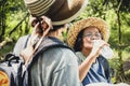 Two senior tourists Trekking in nature with fatigue and thirst.