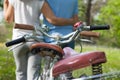 Two seniors with bicycles