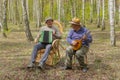 Two seniors are going to play music Royalty Free Stock Photo