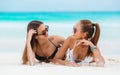 Two sensual women in bikini on a beach Royalty Free Stock Photo