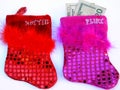 Two sequined and feathered flirt and hottie christmas stockings Royalty Free Stock Photo