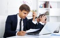 Business male assistants making mistake Royalty Free Stock Photo