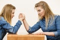 Two women having arm wrestling fight Royalty Free Stock Photo