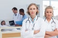 Two serious women doctors standing Royalty Free Stock Photo