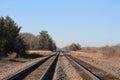 Two sets of railroad tracks on a nice fall day Royalty Free Stock Photo