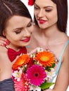 Two lesbian women with flower. Royalty Free Stock Photo