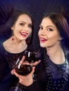 Two lesbian women with red wine Royalty Free Stock Photo