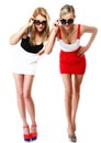 Two women wearing mini skirts Royalty Free Stock Photo