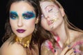 Two sexy young women with creative make-up Royalty Free Stock Photo