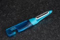 Two shade of blue plastic potato peeler