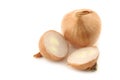 Two shallots and a cut one Royalty Free Stock Photo