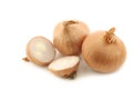 Two shallots and a cut one Royalty Free Stock Photo