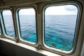 Two ship windows with ocean surface and underwater deep Royalty Free Stock Photo