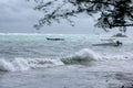 Two ships hit by storms and bad weather along the coast, can be used to promote climate change Royalty Free Stock Photo