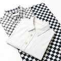 Two shirts on a checkered surface isolated on transparent background Royalty Free Stock Photo