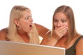 Two Shocked Women Using Laptop Royalty Free Stock Photo