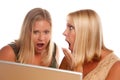 Two Shocked Women Using Laptop Royalty Free Stock Photo