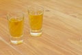 Two shots of homemade herbal liquor