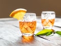 Two shots with tangerine liqueur