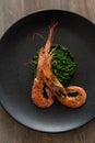 Shrimps on spinach