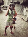 Shy Sumbanese Kids With Wooden Mask